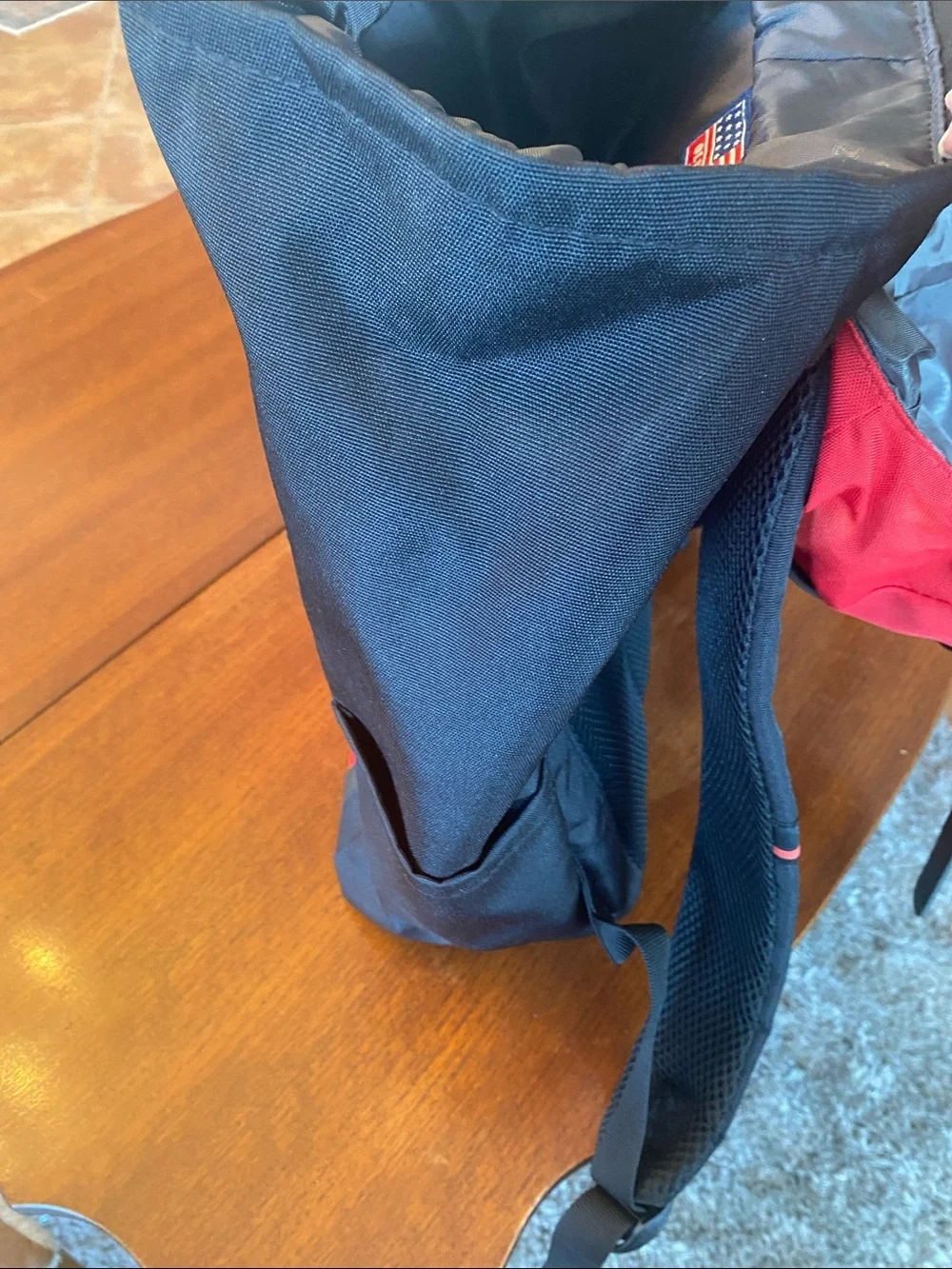 Olympia Activewear Red and Black Canvas Backpack with Front Pocket